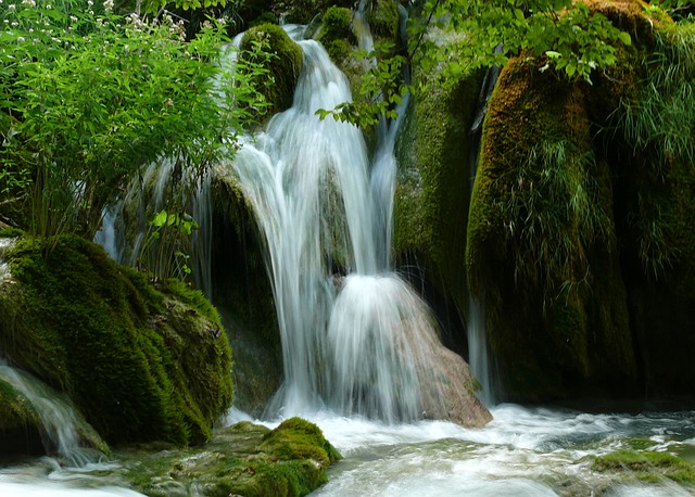 Capture a waterfall's motion by using your shutter speed to blur the water